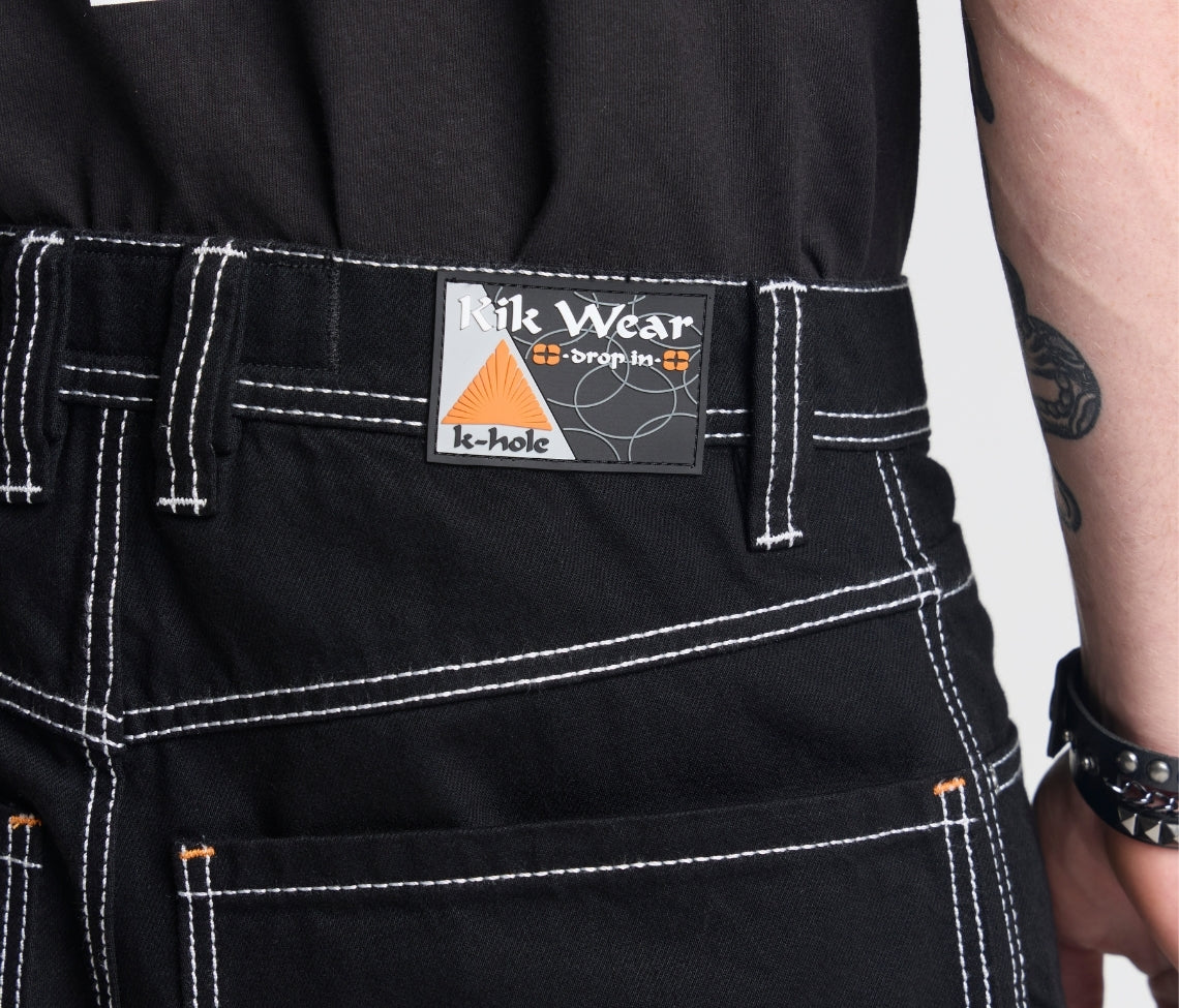 SUPREME REFLEKTIVE K-HOLE 26" SUPER BLACK RINSE￼