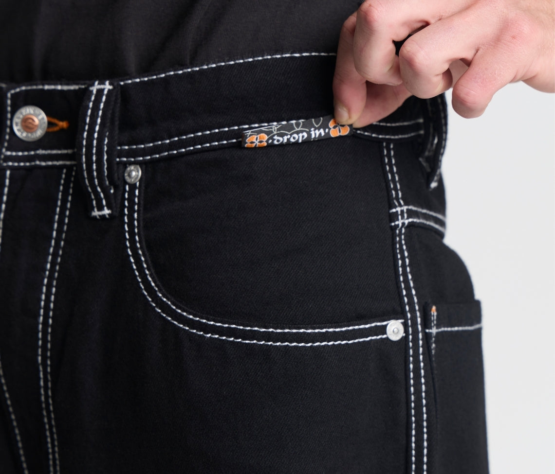 W SUPREME REFLEKTIVE K-HOLE 26" SUPER BLACK RINSE