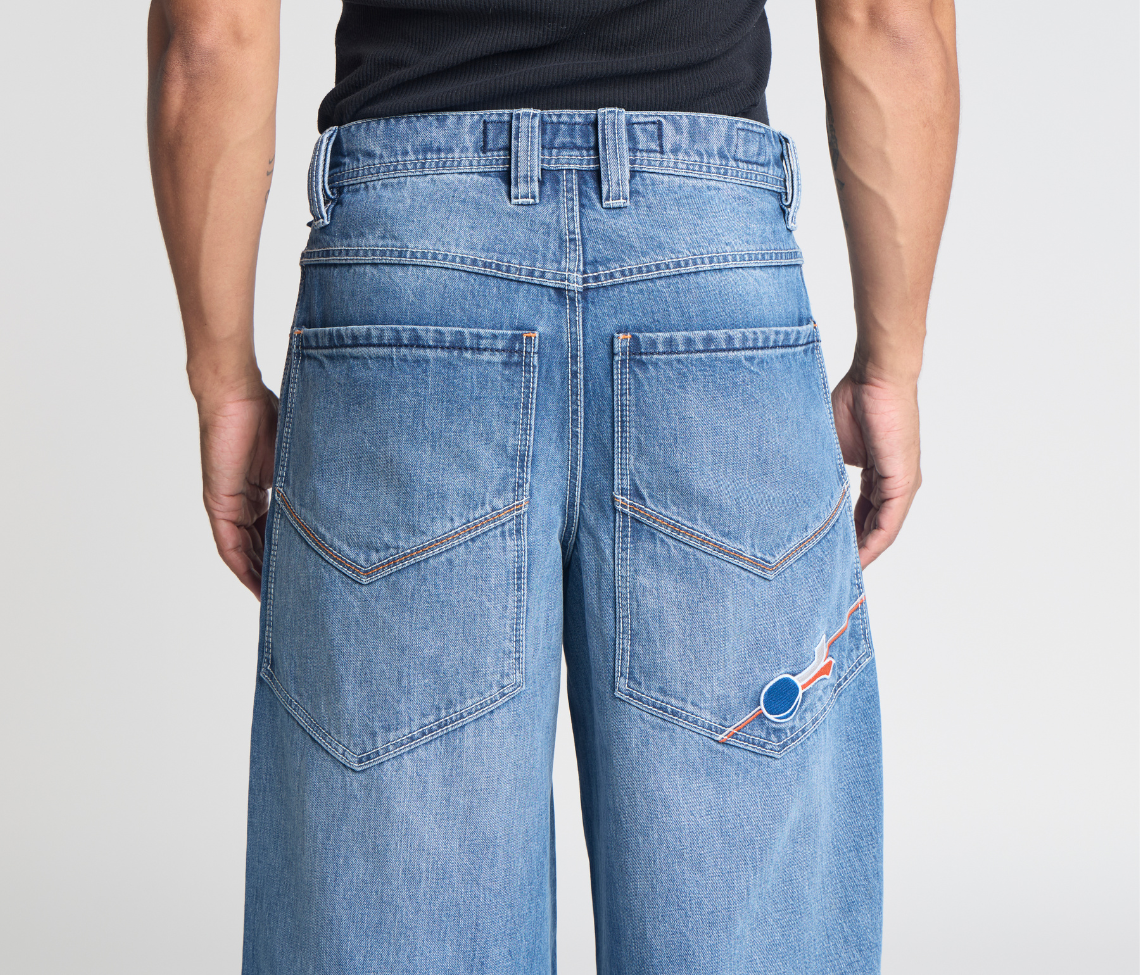 SUPREME PLANET K 26" 90s MEDIUM WASH